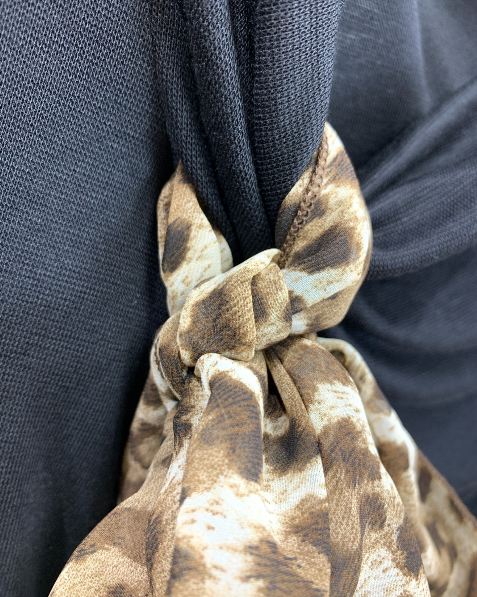 Leopard Bow Peplum Knit Top