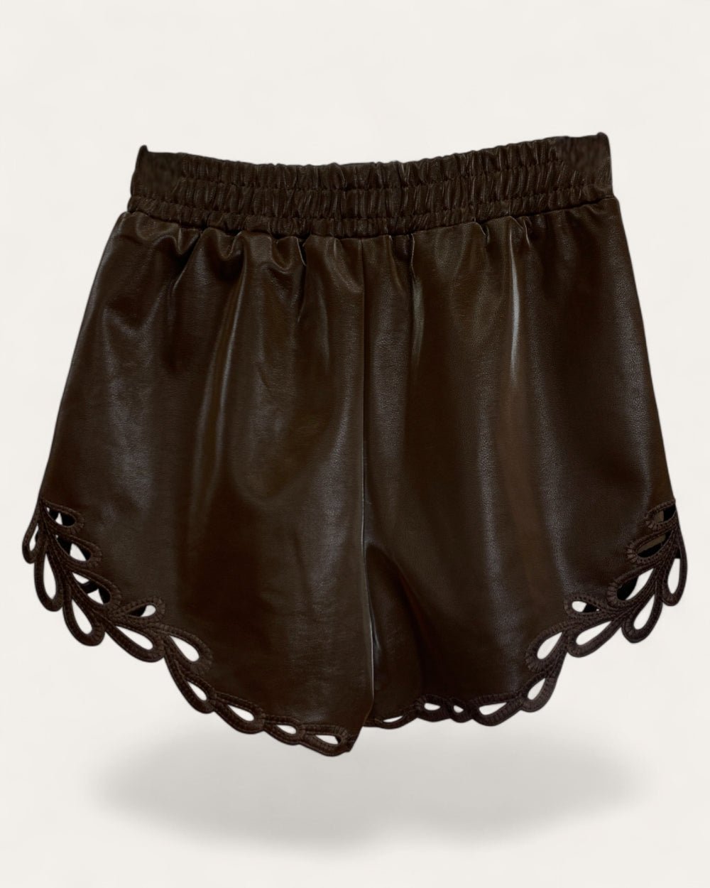 Faux Leather Shorts with Cutout Hem - Zilvina